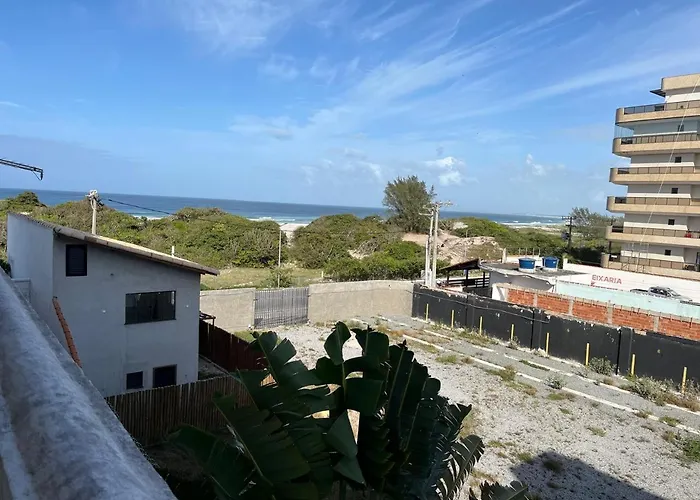 Cobertura Duplex na Praia Grande com Vista para o Pôr do Sol, Churrasqueira e 2 Vagas de Garagem